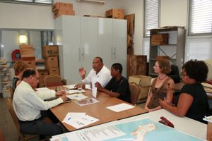 Minister Cooper di bishita na NAAM.